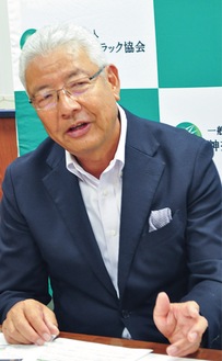 説明する吉田会長