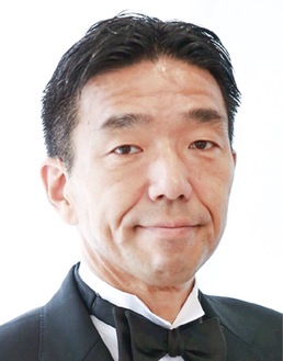 歌う行政書士(R)の石川秀俊さんが対応