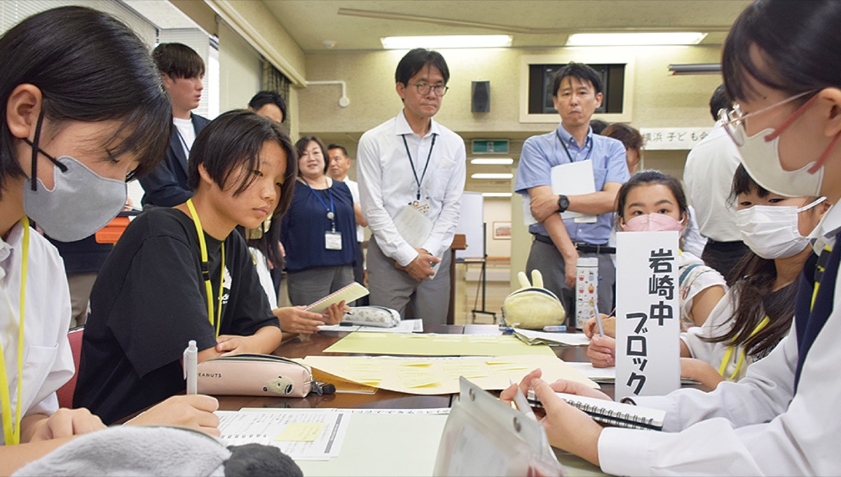 区交流会で意見交わす