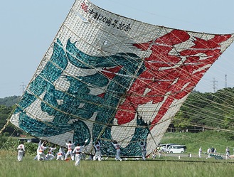 最優秀賞を受賞した小池さんの作品「風がきた」。朝７時半に現地入りし、凧が揚がる瞬間を1枚に収めた