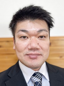 新村賢志氏