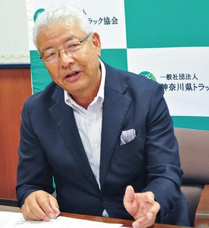 説明する吉田会長